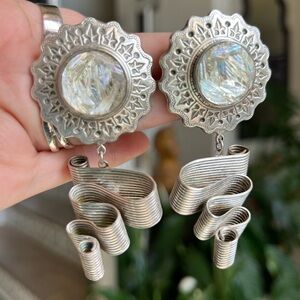 Gorgeous vintage clip on earrings iridescent silver tone  signed Laura Vogel